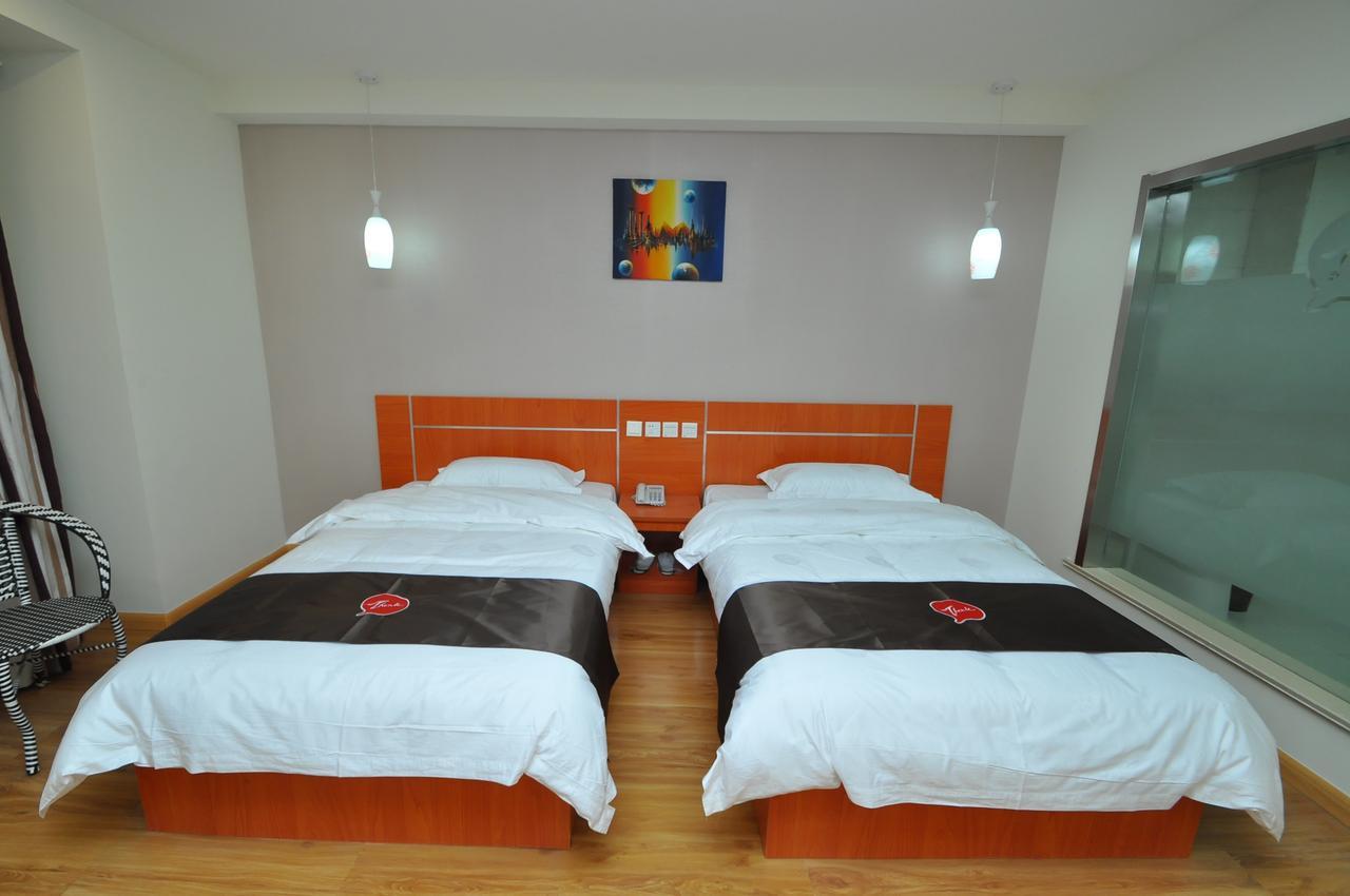 Thank Inn Chain Hotel West Eleven Road Mall Linyi  Exterior photo